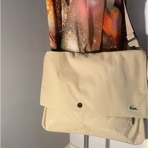 beige color lacost handbag never worn